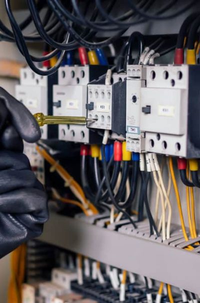 Electrician-Inspecting-An-Electrical-Cabinet (1)