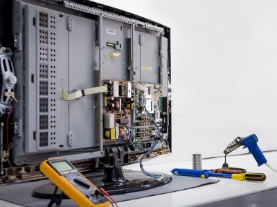 Back of television LCD, circuit board, tv repair on the work table close up